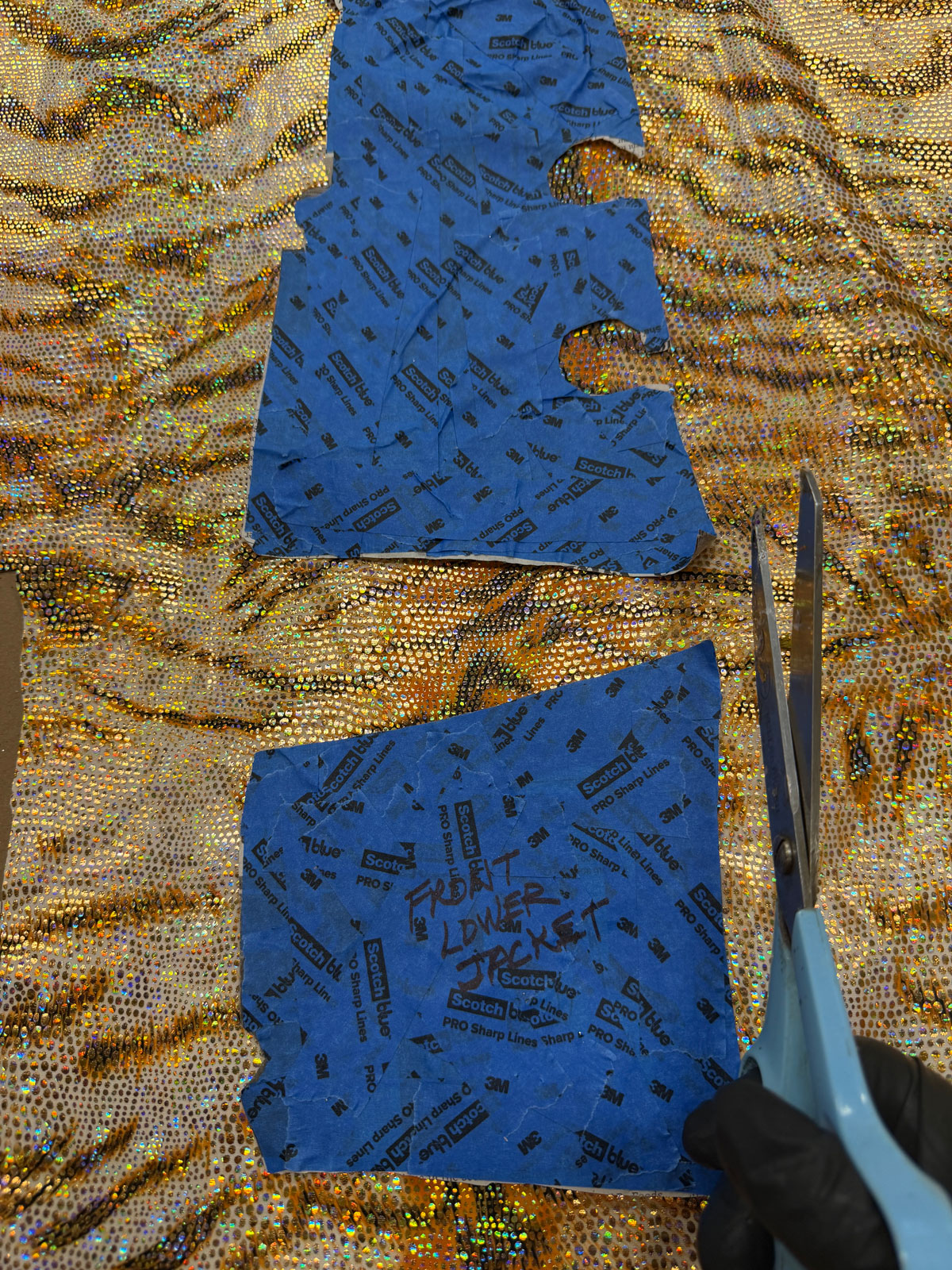 Mary O’Neal cutting decorative material during the creation of The King of Death Valley sculpture