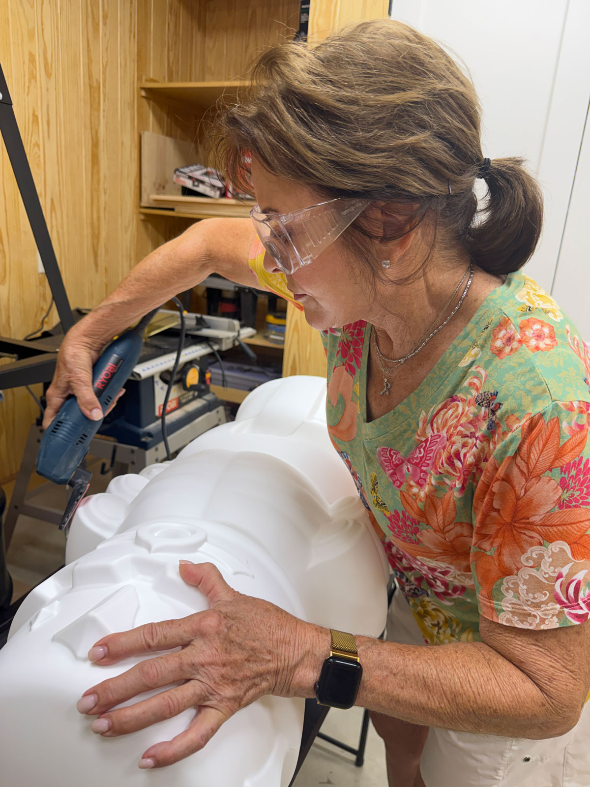 Mary O’Neal sanding the Nutcracker during the creation of The King of Death Valley sculpture