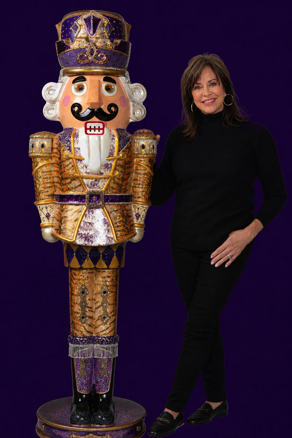Mary O’Neal with The Autumn King Mary O’Neal standing beside her 70" large-scale sculpture of The Autumn King